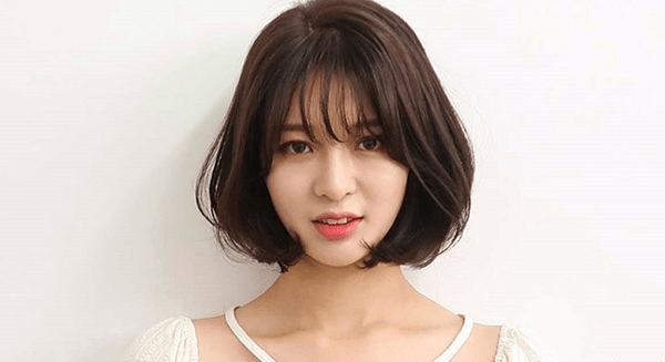 Tóc ngắn xoăn phồng cho bạn nữ nét đẹp dịu dàng